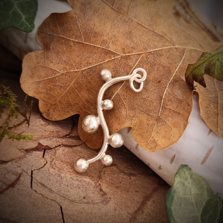 Sterling silver pendant with silver pebbles