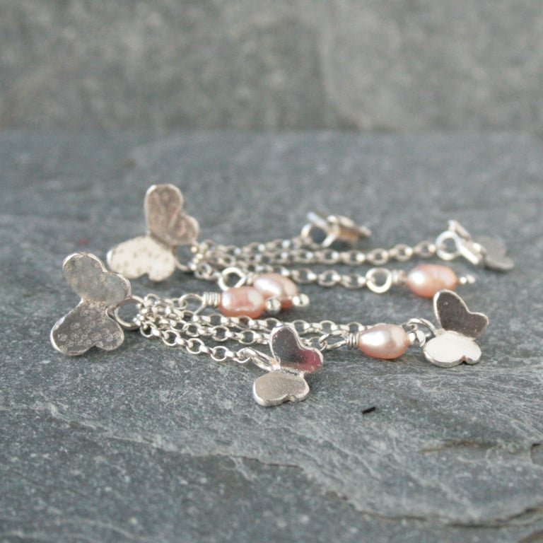 Long silver butterfly and pearl earrings, whimsical silver earrings