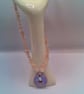Iridescent Lilac Ceramic Donut Pendant on a Rose Quartz Chip Bead Necklace - Image 6