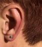 Silver cylindrical ear studs with a brush matte texture - Image 2