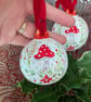 Toadstool hand-painted Christmas ceramic bauble 