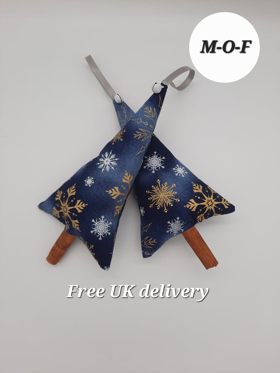 Cinnamon tree hangers, blue snowflake with white bell. Sale 