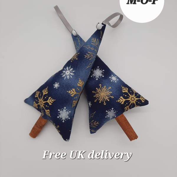 Cinnamon tree hangers, blue snowflake with white bell. Sale 