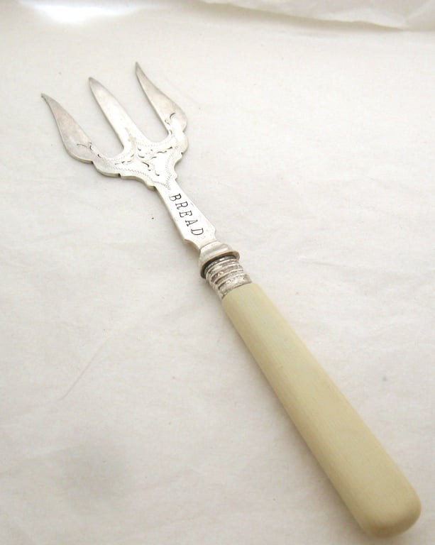 Vintage bread fork, celluloid handle, hand stamped