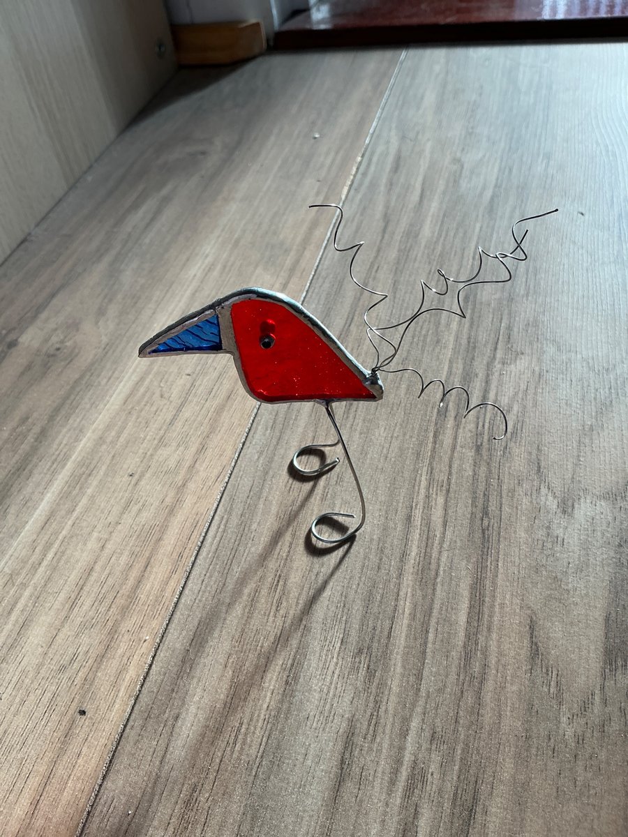 Handmade stained glass free standing bird