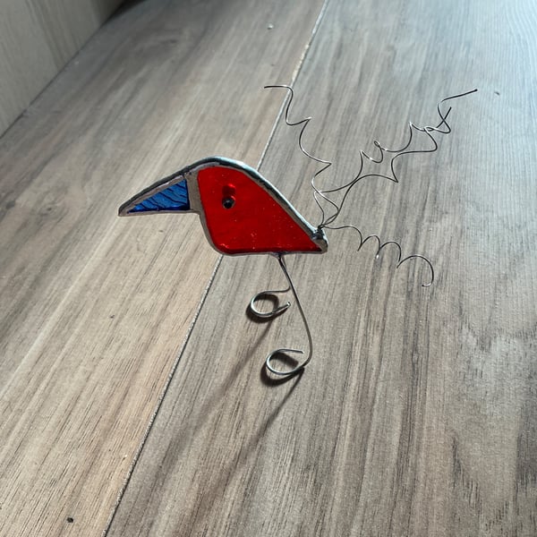 Handmade stained glass free standing bird