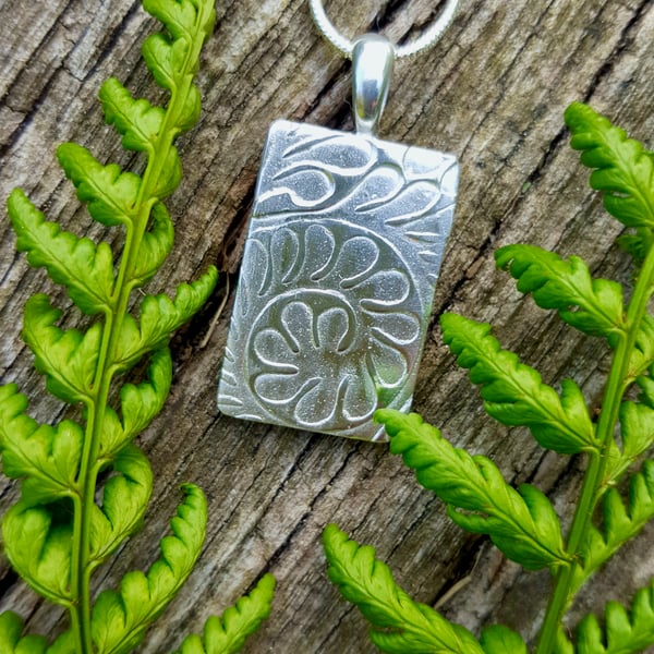 New Zealand Silver Fern inspired rectangle pendant made from recycled silver