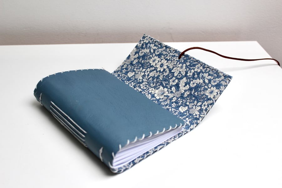 A6 handmade Leather fold over notebook with floral fabric lining 