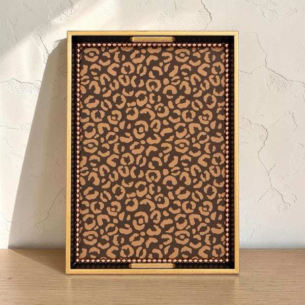 Large grey statement tray with leopard print design 