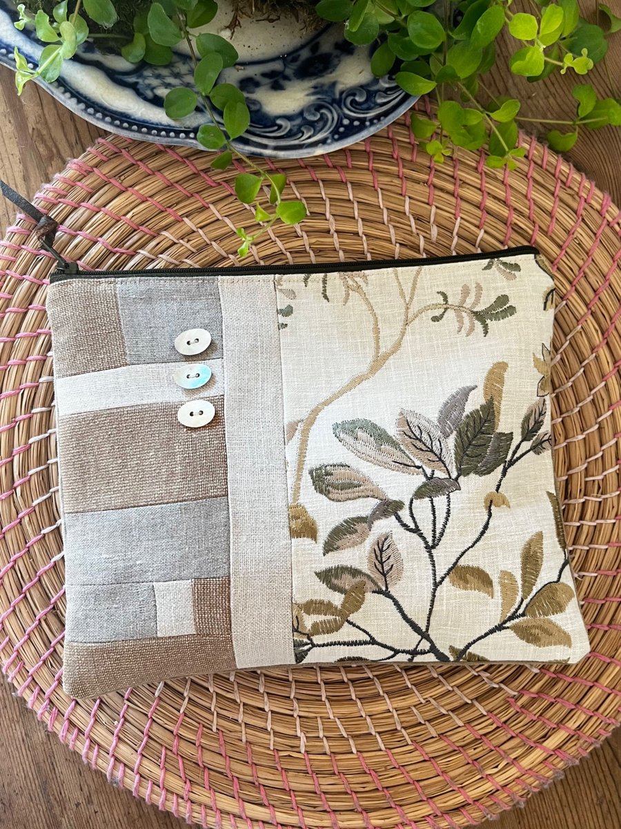 Linen and velvet zip pouch with shell buttons and embroidery