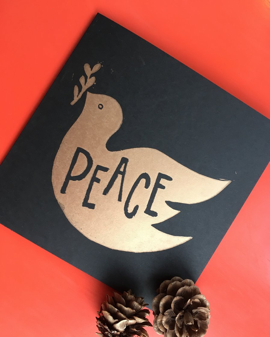 Hand printed bronze linoprint peace dove Christmas card