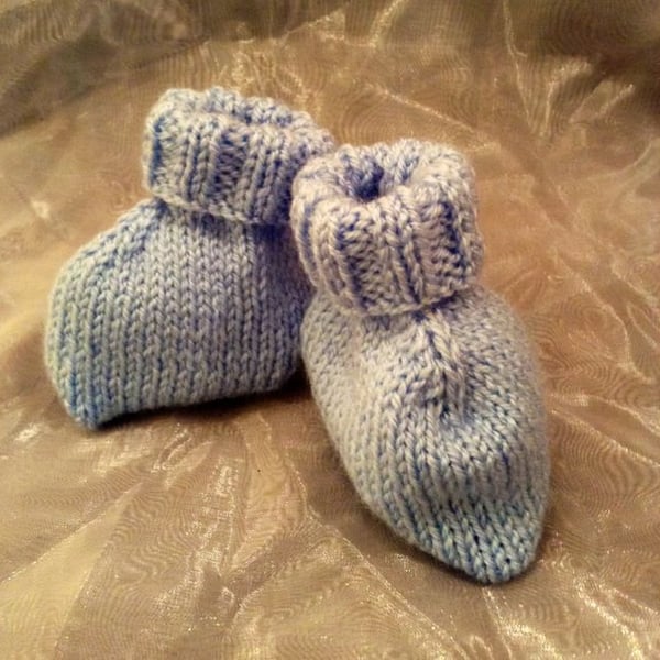 Blue knitted baby booties
