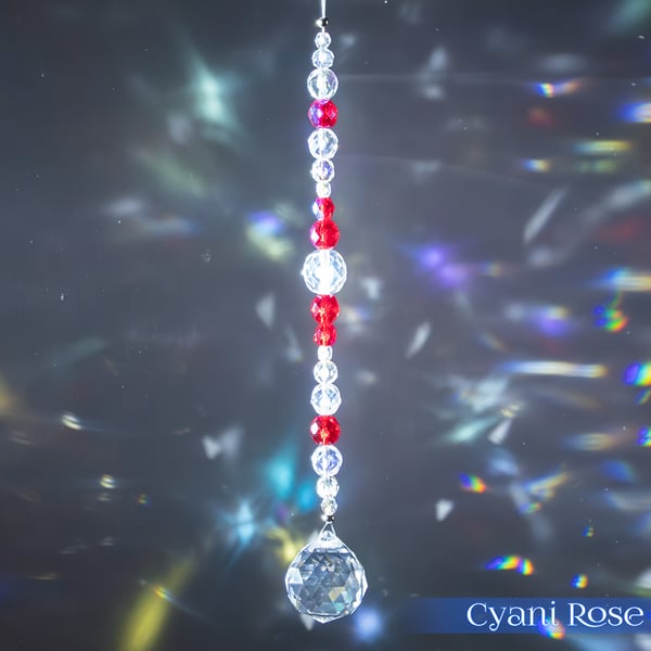 Suncatcher hanging decoration sparkly red and clear