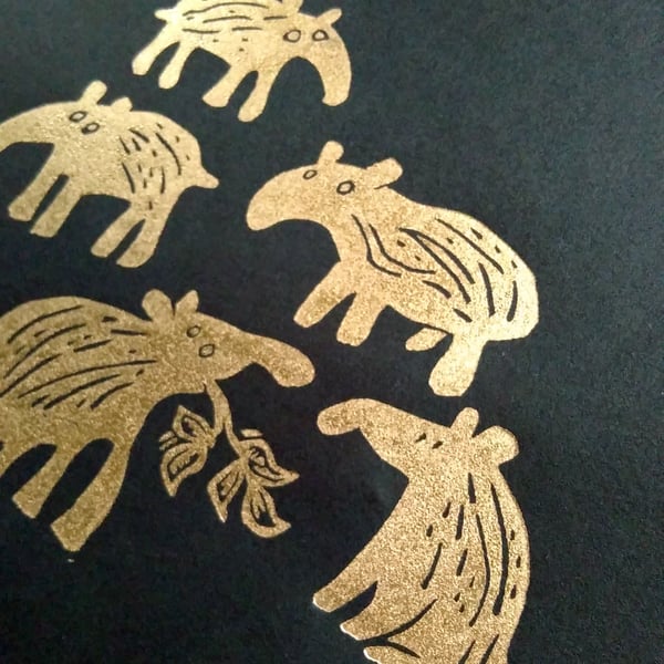 Five Gold Baby Tapirs - lino cut print