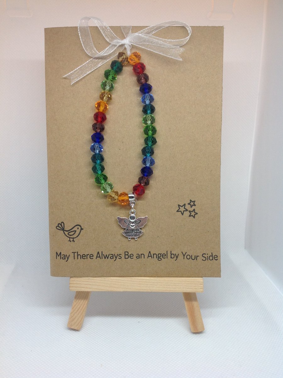 stretch bracelet, rainbow glass beads with angel charm on greetings card