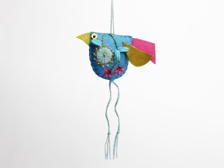 Turquoise felt hand embroidered bird-shaped hanging decoration called Big Chixy