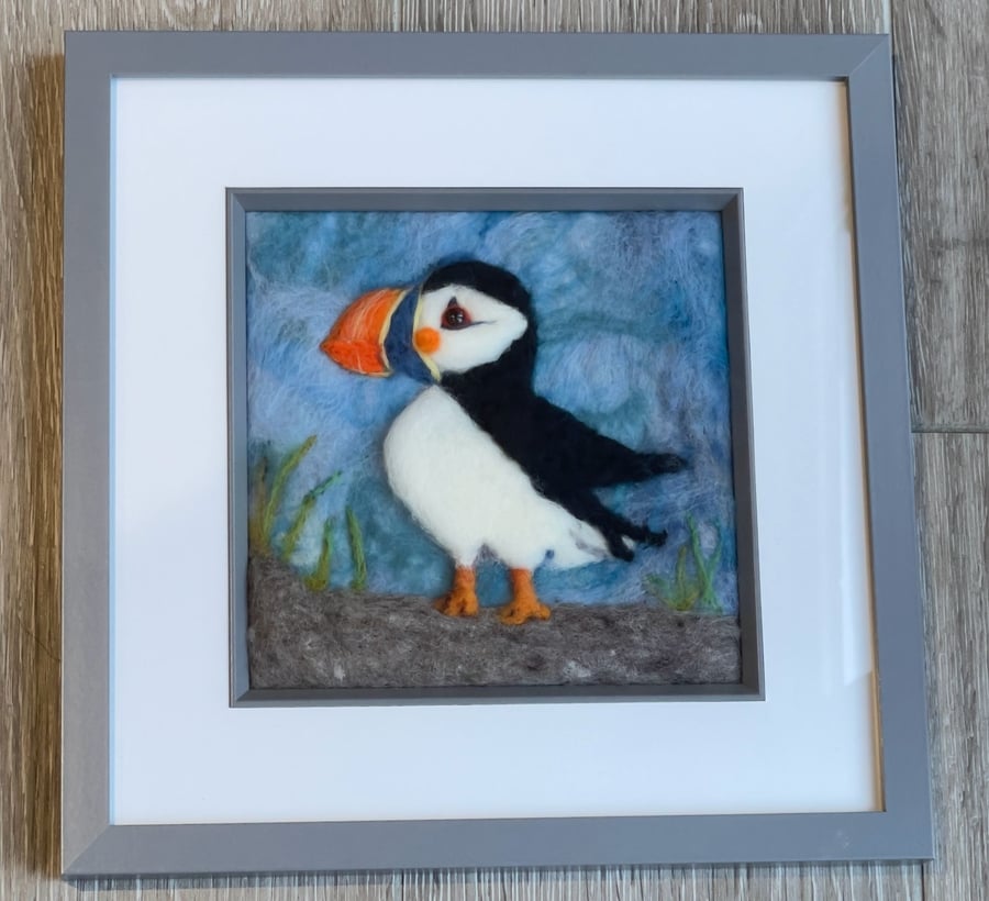 Wool felted puffin painting