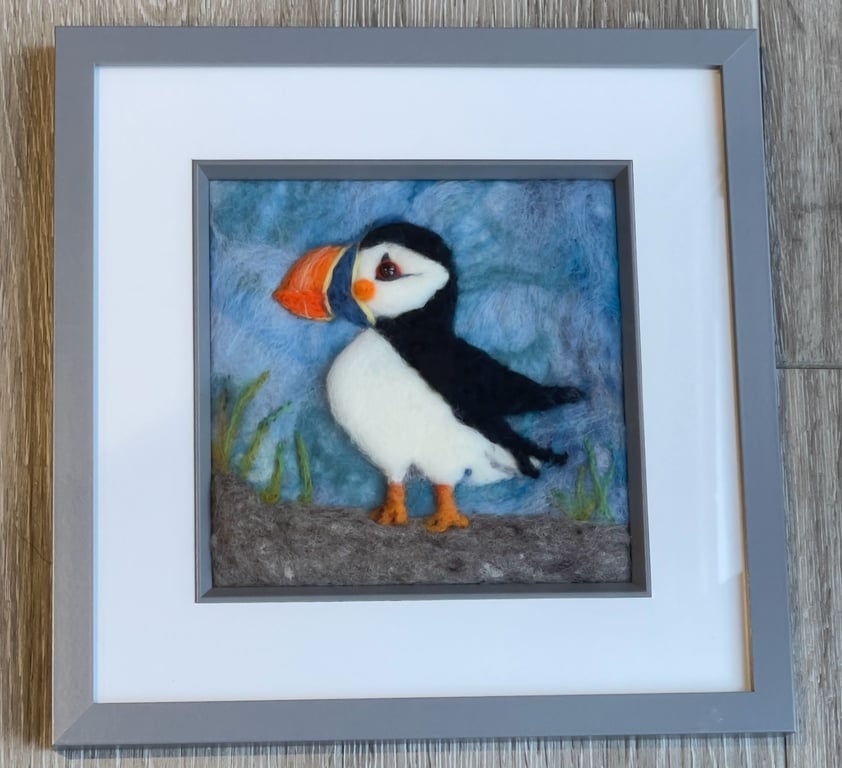Wool felted puffin painting