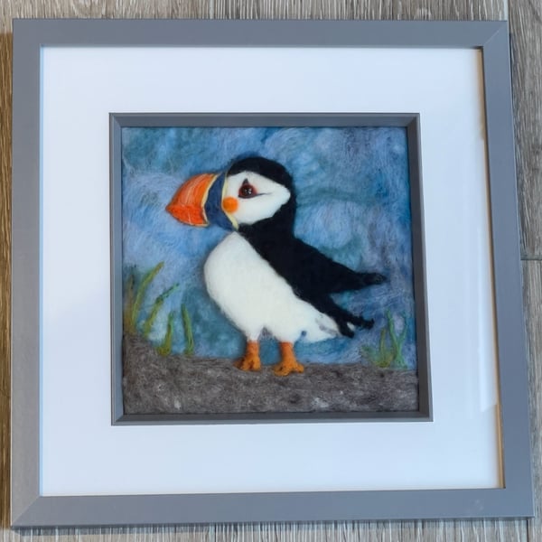 Wool felted puffin painting