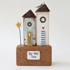 Tall Wooden Sea Huts with Clay Flower and Seagull 'By the Sea'