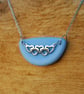 Blue beach glass pendant with multiple hearts - Image 2
