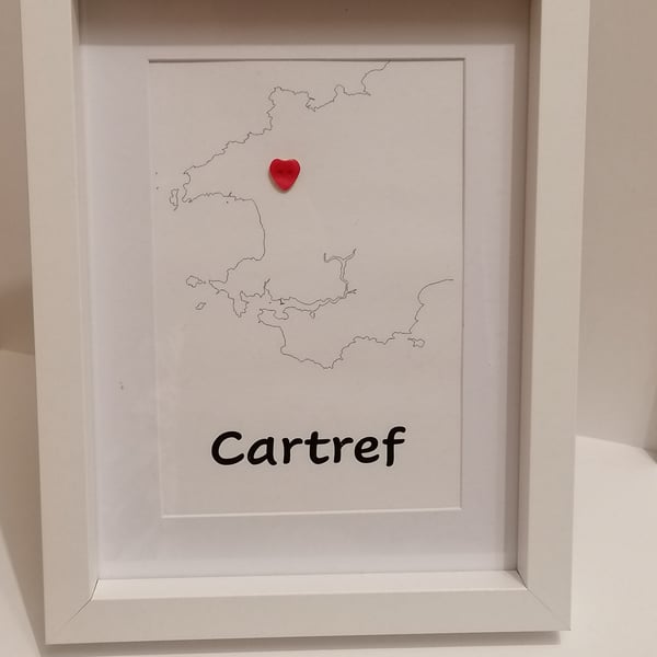 Personalised Pembrokeshire map in a white frame saying "Cartref" Home in Welsh