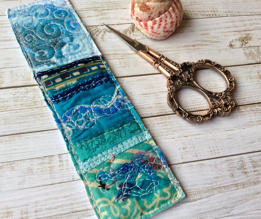 Up-cycled embroidered seascape bookmark. 