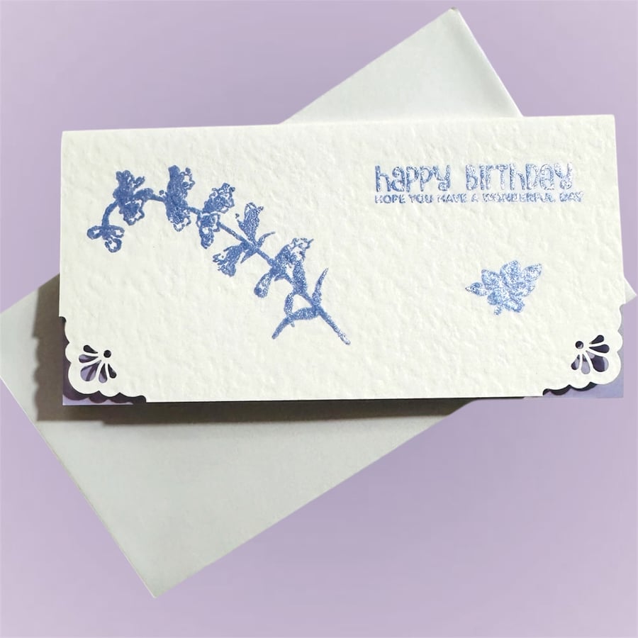 Luxury birthday card with pastel purple flowers and matching lilac insert. 
