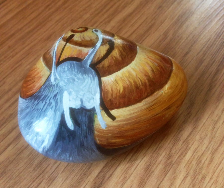 Snail hand painted on rock