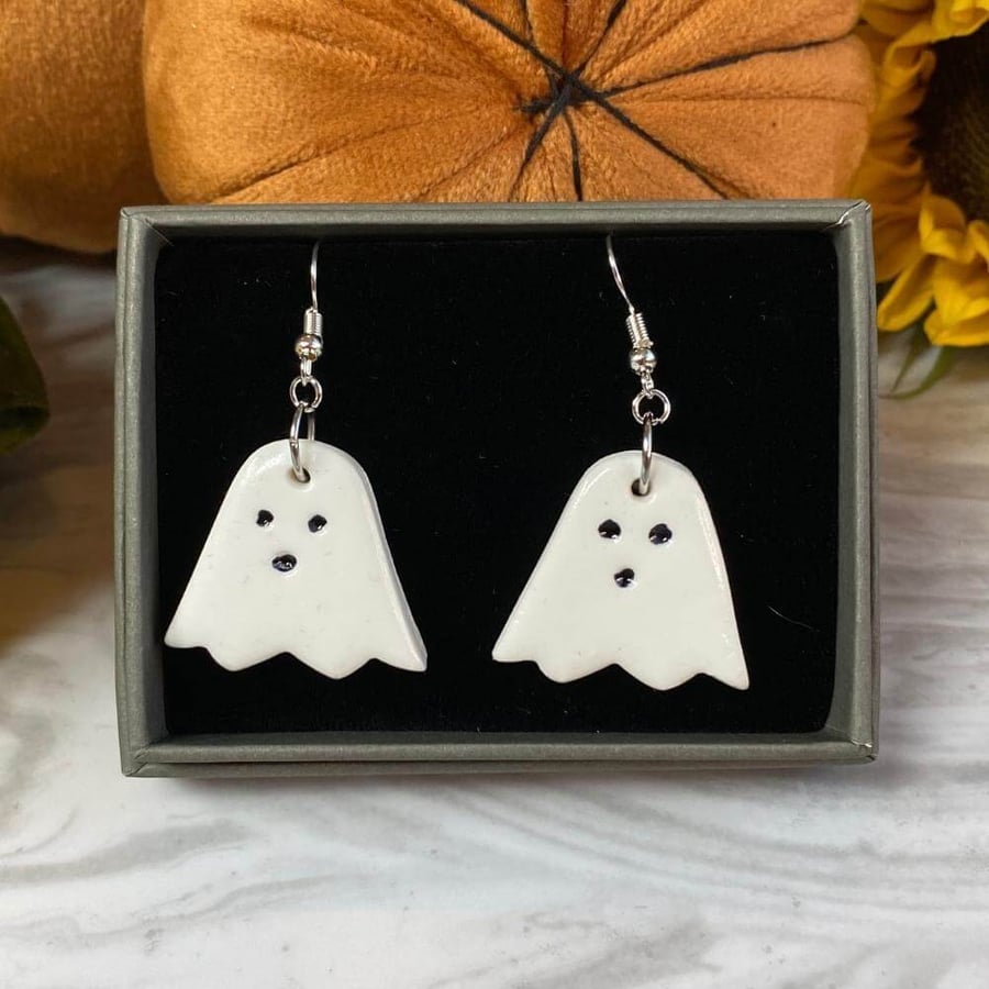 Cute ghost earrings made with polymer clay on sterling silver ear wires.