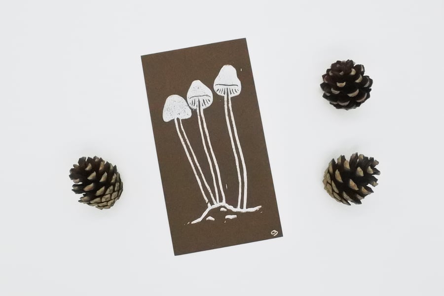 Brown Mushrooms – Small handmade lino print on coloured paper