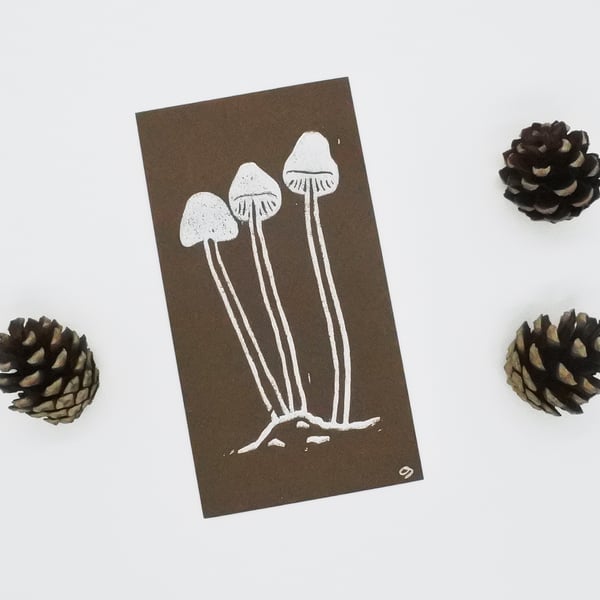 Brown Mushrooms – Small handmade lino print on coloured paper