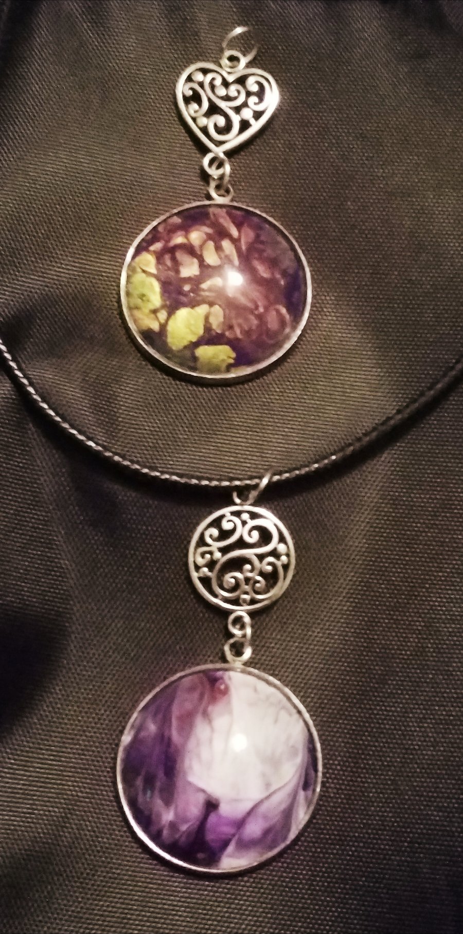 2 for 1 handmade fluid art pendants with charm. Purples