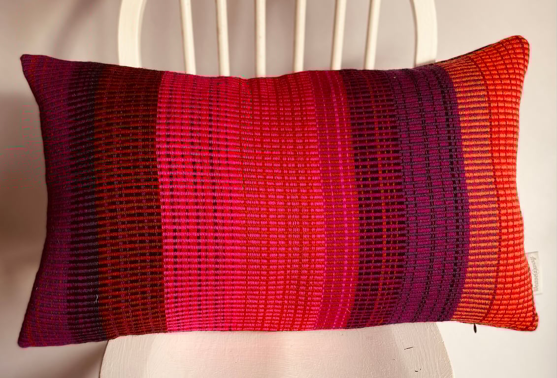 Wool cushion in warm summer colours