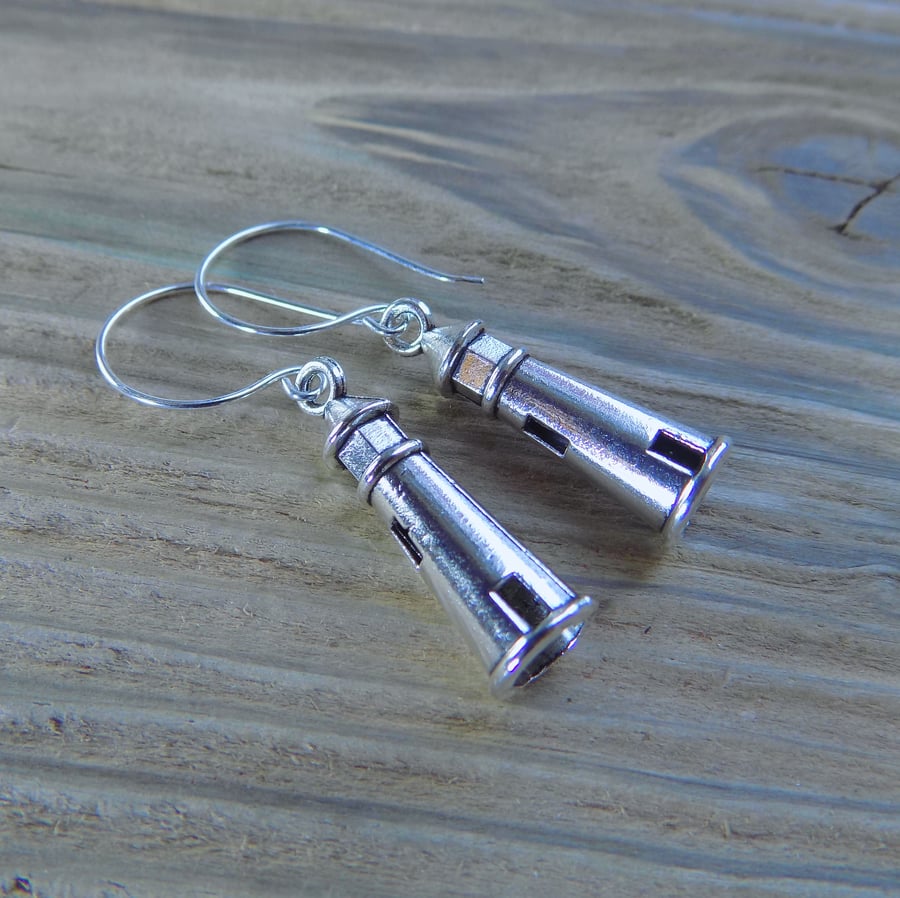 Fun lighthouse charm earrings with sterling silver hooks