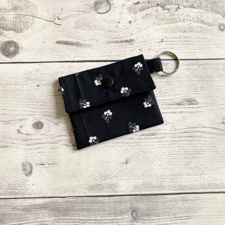 Lip balm keyring for round tins or long tubes. Black and white floral keychain.