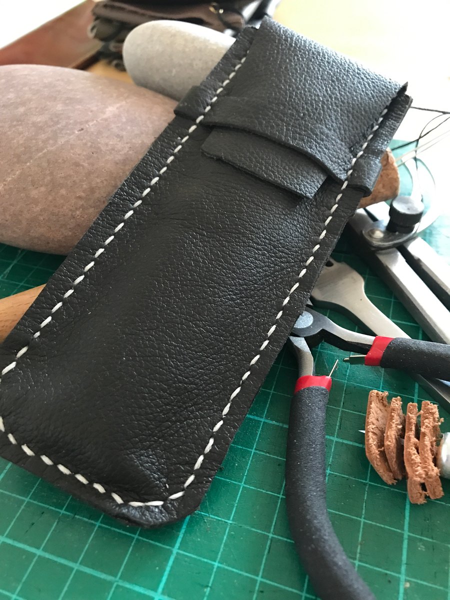 Leather pen case. 