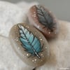 blue and grey feather pair - pebble art