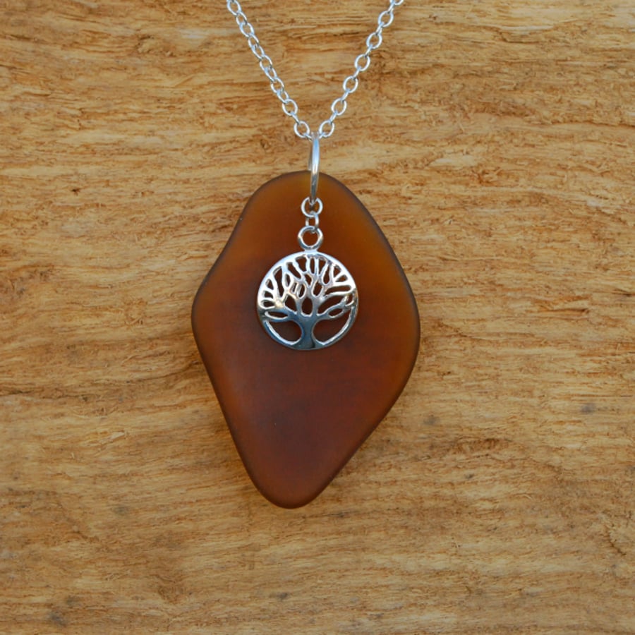 Beach glass pendant with tree of life charm