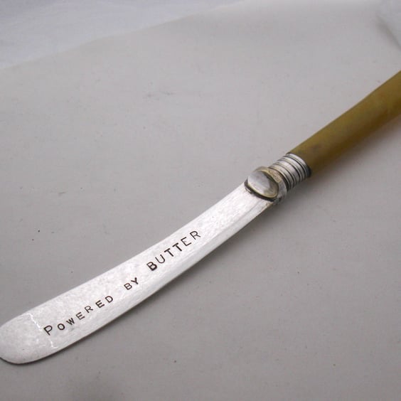 Powered by Butter, vintage spreader, yellow plastic handle