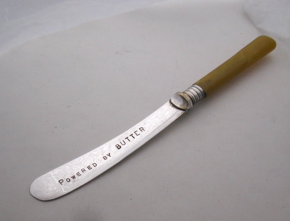 Powered by Butter, vintage spreader, yellow plastic handle