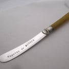 Powered by Butter, vintage spreader, yellow plastic handle