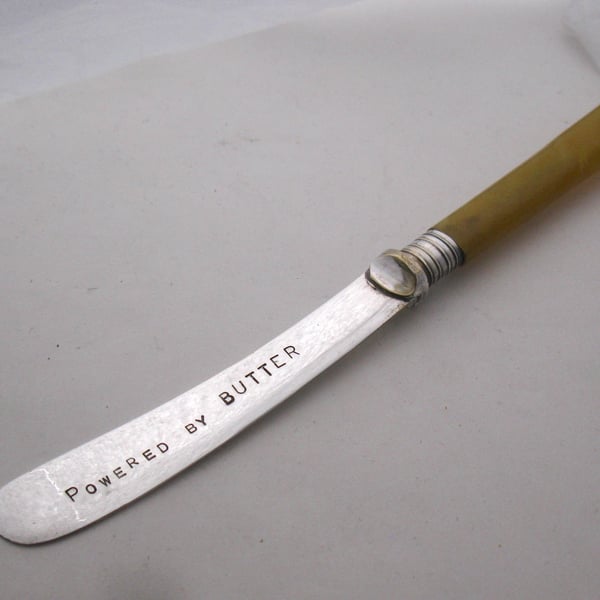 Powered by Butter, vintage spreader, yellow plastic handle