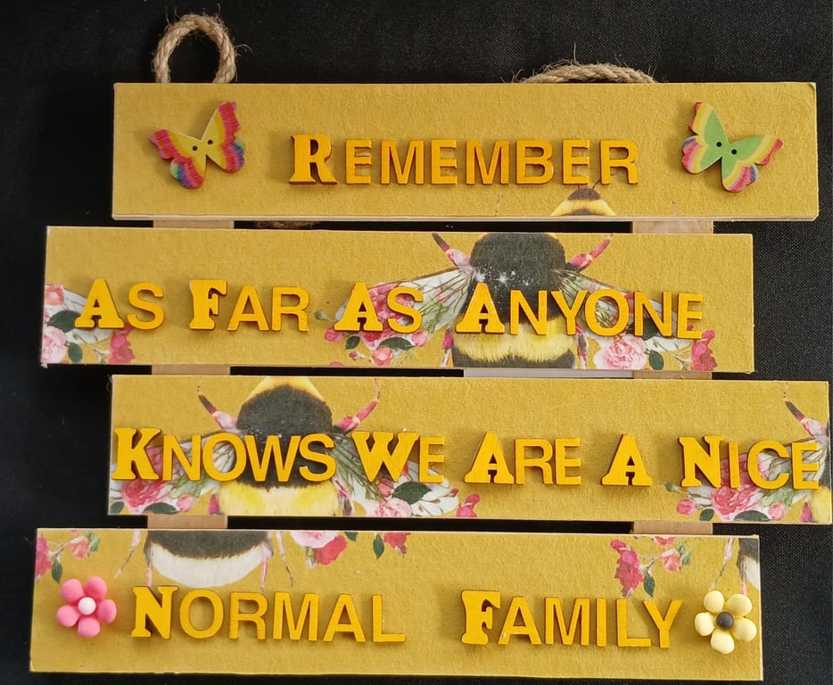 Hand decorated hanging wooden sign 