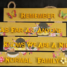 Hand decorated hanging wooden sign 