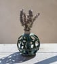 Green & white bud vase.