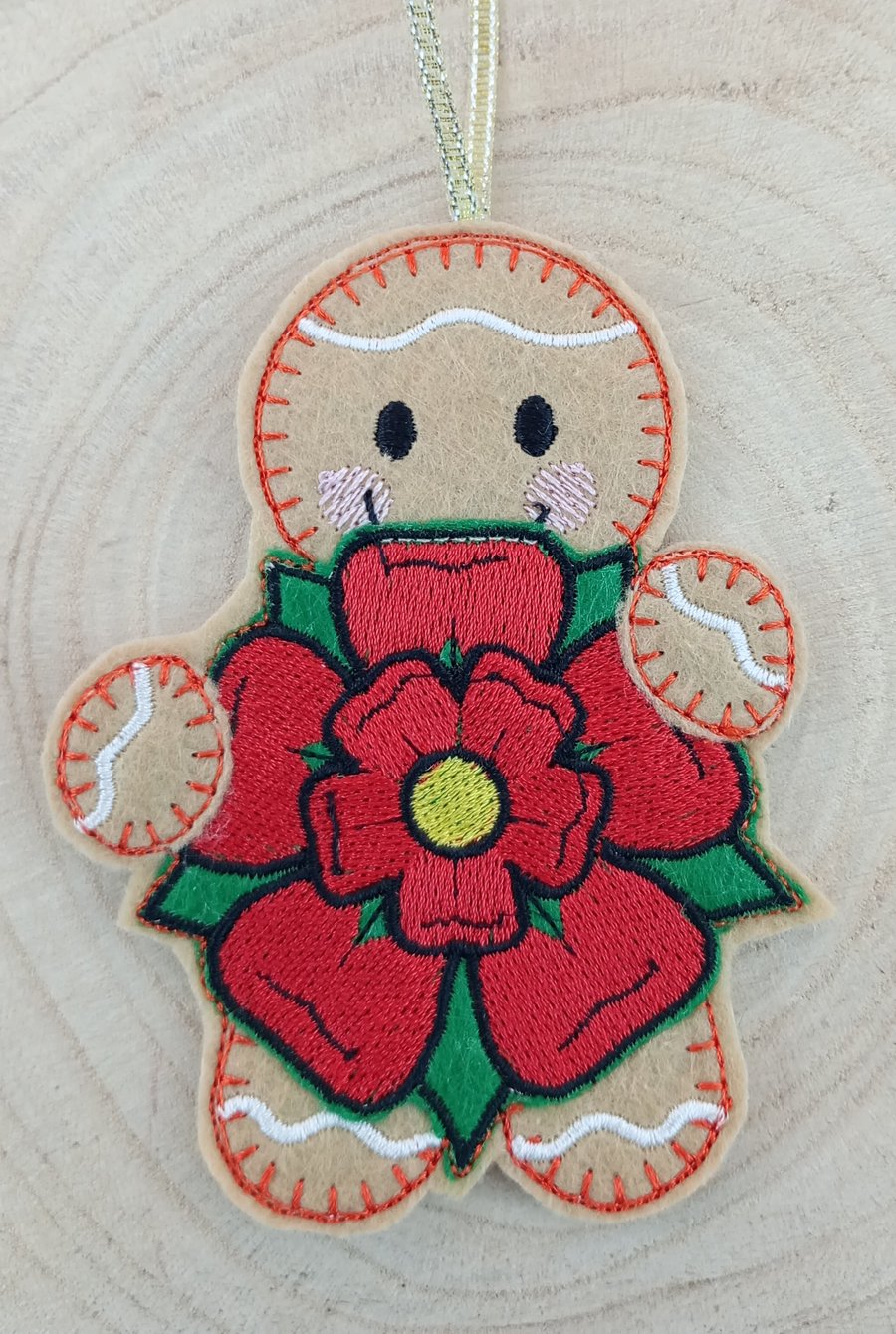 Gingerbread Man Holding a Lancashire Rose Felt Hanging Decoration