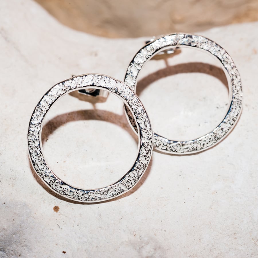 handmade large shimmering circles of ecosilver 