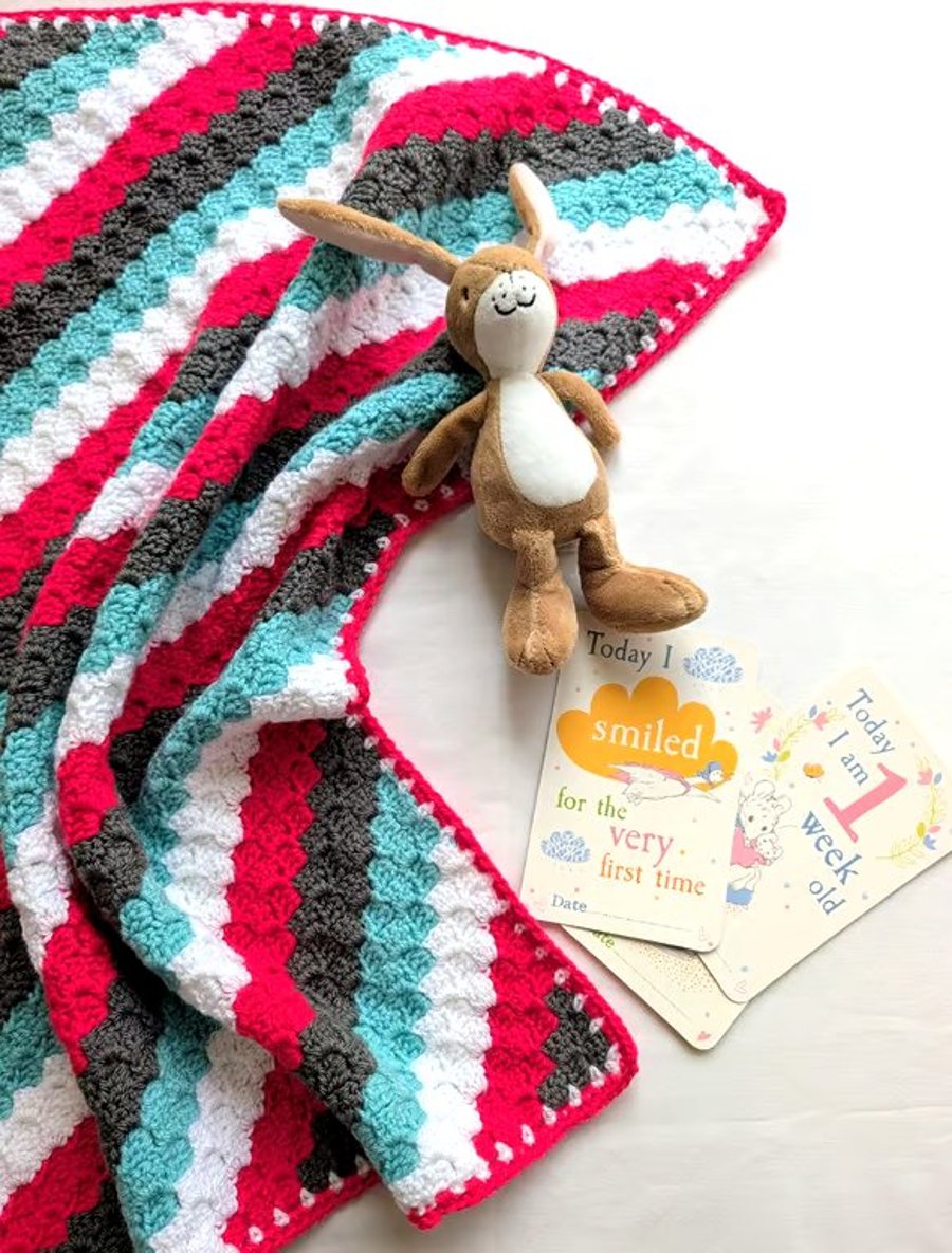 Image of Vibrant crochet baby blanket 