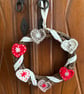 Scandi-style Christmas wreath with crocheted hearts and ribbon - Image 6